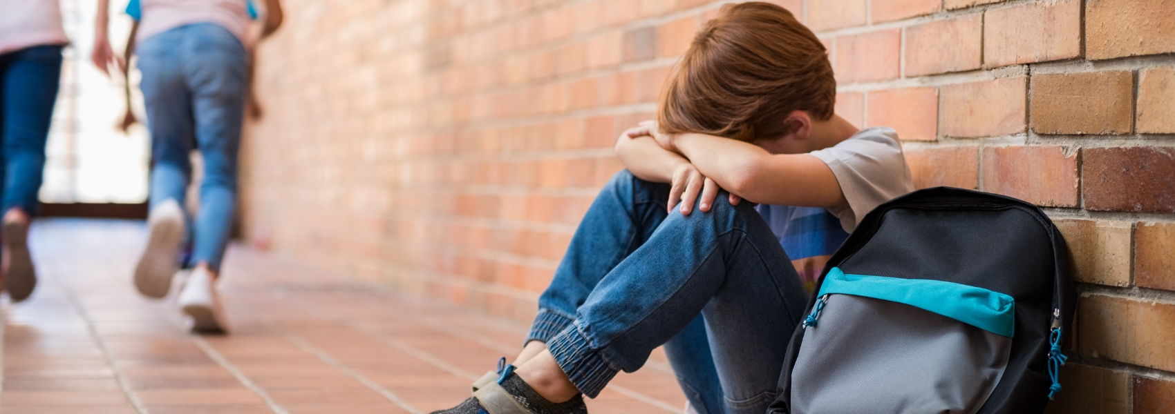 criança vítima de bullying
